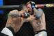December 10, 2015; Las Vegas, NV, USA; Santiago Ponzinibbio throws a punch against Andreas Stahl during UFC Fight Night at The Chelsea at the Cosmopolitan. Mandatory Credit: Gary A. Vasquez-USA TODAY Sports