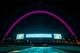 LONDON, ENGLAND - SEPTEMBER 29: To celebrate Breast Cancer Awareness month, the Wembley Arch turns pink to highlight The Football Association and Breast Cancer Care's new 'Pass it on' campaign at Wembley Stadium on September 29, 2014 in London, England.