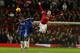 MANCHESTER, ENGLAND - DECEMBER 28: John Obi Mikel of Chelsea and Wayne Rooney of Manchester United during the Barclays Premier League match between Manchester Untied and Chelsea at Old Trafford on December 28, 2015 in Manchester, England. (Photo by Matt