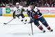 DENVER, CO - DECEMBER 09: Francois Beauchemin #32 of the Colorado Avalanche controls the puck against David Perron #57 of the Pittsburgh Penguins at Pepsi Center on December 9, 2015 in Denver, Colorado. The Penguins defeated the Avalanche 4-2. (Photo by