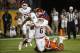 Dec 31, 2015; Miami Gardens, FL, USA; Oklahoma Sooners quarterback Baker Mayfield (6) is sacked by Clemson Tigers defensive end Kevin Dodd (98) in the third quarter of the 2015 CFP Semifinal at the Orange Bowl at Sun Life Stadium. Mandatory Credit: Kim Kl