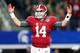 ARLINGTON, TX - DECEMBER 31: Quarterback Jake Coker #14 of the Alabama Crimson Tide reacts after throwing a six-yard touchdown pass turnover wide receiver Calvin Ridley #3 in the third quarter against the Michigan State Spartans during the Goodyear Cotto