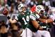 EAST RUTHERFORD, NJ - DECEMBER 27: Ryan Fitzpatrick #14 of the New York Jets throws a pass against the New England Patriots during their game at MetLife Stadium on December 27, 2015 in East Rutherford, New Jersey. (Photo by Jeff Zelevansky/Getty Images)
