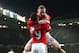 MANCHESTER, ENGLAND - JANUARY 02: Wayne Rooney (R) of Manchester United celebrates scoring his team's second goal with his team mate Anthony Martial (L) during the Barclays Premier League match between Manchester United and Swansea City at Old Trafford o