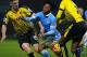Manchester City's English midfielder Raheem Sterling (C) vies with Watford's Northern Irish defender Craig Cathcart (L) and Watford's Cameroonian defender Allan Nyom during the English Premier League football match between Watford and Manchester City at V