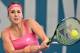 Switzerland's Belinda Bencic hits a return against Sara Errani of Italy in their women's singles match on the second day at the Brisbane International tennis tournament on January 4, 2016. AFP PHOTO / Saeed KHAN
-- IMAGE RESTRICTED TO EDITORIAL USE - S
