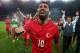 Turkey's midfielder Arda Turan (C) celebrates at the end of the Euro 2016 Group A qualifying football match between Turkey and Iceland on October 13, 2015 at the Konya Arena stadium in Konya. AFP PHOTO / STRINGER (Photo credit should read STR/AFP/G