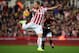 STOKE ON TRENT, ENGLAND - DECEMBER 26: Ashley Young of Manchester United chases Marko Arnautovic of Stoke City as he controls the ball during the Barclays Premier League match between Stoke City and Manchester United at Britannia Stadium on December 26,