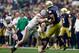 GLENDALE, AZ - JANUARY 01: Defensive lineman Joey Bosa #97 of the Ohio State Buckeyes hits quarterback DeShone Kizer #14 of the Notre Dame Fighting Irish during the first quarter of the BattleFrog Fiesta Bowl at University of Phoenix Stadium on January 1