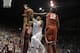 Buddy Hield looks on as Khadeem Lattin and Jordan Woodard deny Frank Mason III's attempt to end the game in regulation.