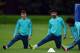 Chelsea's Brazilian midfielder Oscar (L), Spanish striker Diego Costa (C) and Brazilian midfielder Willian (R) stretch during a training session at Chelsea's training ground, in Stoke D'Abernon, near London, on September 15, 2015, ahead of the team's fo