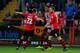 EXETER, ENGLAND - DECEMBER 6: Ollie Watkins of Exeter City(C) celebrates after scoring his sides second goal during the Emirates FA Cup Second Round match between Exeter City and Port Vale at St James Park on December 6, 2015 in Exeter England. (Photo by