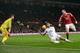 Manchester United's English striker Wayne Rooney (R) scores his team's second goal during the English Premier League football match between Manchester United and Swansea City at Old Trafford in Manchester, north west England, on January 2, 2016. AFP PHOTO