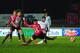 EXETER, ENGLAND - JANUARY 08: Jerome Sinclair of Liverpool beats Jordan Moore-Taylor of Exeter City (15) to score their first and equalising goal during the Emirates FA Cup third round match between Exeter City and Liverpool at St James Park on January 8