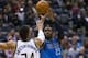 Jan 8, 2016; Milwaukee, WI, USA; Dallas Mavericks guard Wesley Matthews (23) shoots against Milwaukee Bucks forward Giannis Antetokounmpo (34) during the first quarter at BMO Harris Bradley Center. Mandatory Credit: Jeff Hanisch-USA TODAY Sports