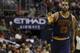 Jan 6, 2016; Washington, DC, USA; Cleveland Cavaliers forward LeBron James (23) reacts after making a three point basket against the Washington Wizards in the third quarter at Verizon Center. The Cavaliers won 121-115. Mandatory Credit: Geoff Burke-USA TO