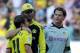 Dortmund's Mario Goetze, headcoach Juergen Klopp and goalkeeper Roman Weidenfeller celebrate after the German first division Bundesliga football match Borussia Dortmund vs FC Augsburg in the western German city of Dortmund on October 1, 2011. Dortmund won