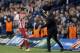 Atletico Madrid's Brazilian-born forward Diego da Silva Costa (L) celebrates scoring his team's second goal with Atletico Madrid's Argentinian coach Diego Simeone during the UEFA Champions League semi-final second leg football match between Chelsea and At