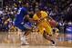 BATON ROUGE, LA - JANUARY 05: Tim Quarterman #55 of the LSU Tigers drives around Jamal Murray #23 of the Kentucky Wildcats during the second half of a game at the Pete Maravich Assembly Center on January 5, 2016 in Baton Rouge, Louisiana. LSU defeated K