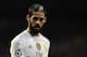 Real Madrid's midfielder Isco looks on with a bleeding injury to his head during the UEFA Champions League football match Real Madrid CF vs Paris Saint-Germain (PSG) at the Santiago Bernabeu stadium in Madrid on November 3, 2015. / AFP / JAVIER SORIANO