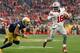 GLENDALE, AZ - JANUARY 01: Quarterback J.T. Barrett #16 of the Ohio State Buckeyes scrambles with the football against the Notre Dame Fighting Irish during the BattleFrog Fiesta Bowl at University of Phoenix Stadium on January 1, 2016 in Glendale, Arizon