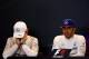 AUSTIN, TX - OCTOBER 25: Lewis Hamilton of Great Britain and Mercedes GP smiles next to a dejected Nico Rosberg of Germany and Mercedes GP in a press conference after winning the United States Formula One Grand Prix and the championship at Circuit of The