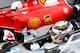 SPIELBERG, AUSTRIA - JUNE 20: Lewis Hamilton of Great Britain and Mercedes GP gets out of his car in Parc Ferme next to Sebastian Vettel of Germany and Ferrari after claiming pole position during qualifying for the Formula One Grand Prix of Austria at Re