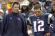 FOXBORO, UNITED STATES: Quarterback Tom Brady (R) stands on the sidelines with injured Quarterback Drew Bledsoe of the New England Patriots during the first quarter of action against the San Diego Chargers 14 October 2001 in Foxboro Stadium in Foxboro, M