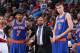 PORTLAND, OR - DECEMBER 12: Head Coach Derek Fisher of the New York Knicks looks on with Carmelo Anthony #7 and Kristaps Porzingis #6 during the game against the Portland Trail Blazers on December 12, 2015 at the Moda Center in Portland, Oregon. NOTE TO