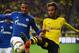 Dortmund's Gabonese striker Pierre-Emerick Aubameyang (R) and Schalke's Cameroonian defender Joel Matip vie for the ball during the German first division football Bundesliga match Borussia Dortmund vs FC Schalke 04 on November 8, 2015, 2015 in Dortmund, w