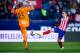 MADRID, SPAIN - JANUARY 14: Antoine Griezmann (R) of Atletico de Madrid competes for the ball with goalkeeper Yoel Rodriguez (L) of Rayo Vallecano de Madrid to score during the Copa del Rey Round of 16 second leg match between Club Atletico Madrid and Ra