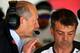 SHANGHAI, CHINA - APRIL 11: Chairman and Chief Executive Officer of McLaren Group Ron Dennis speaks with a member of his team in the garage during final practice for the Formula One Grand Prix of China at Shanghai International Circuit on April 11, 2015