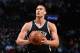 BROOKLYN, NY - JANUARY 13: Brook Lopez #11 of the Brooklyn Nets shoots a foul shot against the New York Knicks on January 13, 2015 at Barclays Center in Brooklyn, New York. NOTE TO USER: User expressly acknowledges and agrees that, by downloading and or