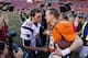 DENVER, CO - JANUARY 19: Tom Brady #12 of the New England Patriots congratulates Peyton Manning #18 of the Denver Broncos after the Broncos defeated the Patriots 26 to 16 during the AFC Championship game at Sports Authority Field at Mile High on January