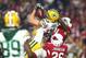 Jan 16, 2016; Glendale, AZ, USA; Green Bay Packers wide receiver Jeff Janis (83) catches a hail mary pass for a touchdown against Arizona Cardinals cornerback Patrick Peterson (21) and free safety Rashad Johnson (26) during the fourth quarter in a NFC Div
