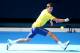 MELBOURNE, AUSTRALIA - JANUARY 18: Novak Djokovic of Serbia plays a backhand in his first round match against Hyeon Chung of Korea during day one of the 2016 Australian Open at Melbourne Park on January 18, 2016 in Melbourne, Australia. (Photo by Quinn