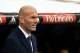 Real Madrid's French coach Zinedine Zidane looks on prior to the Spanish league football match Real Madrid CF vs Real Sporting de Gijon at the Santiago Bernabeu stadium in Madrid on January 17, 2016. Real Madrid won 5-1. AFP PHOTO/ PEDRO ARMESTRE / AFP