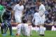 MADRID, SPAIN - JANUARY 17: Gareth Bale of Real Madrid lies injured beside Cristiano Ronaldo and Karim Benzema during the La Liga match between Real Madrid CF and Sporting Gijon at Estadio Santiago Bernabeu on January 17, 2016 in Madrid, Spain. (Photo b
