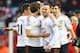 LIVERPOOL, ENGLAND - JANUARY 17: Wayne Rooney of Manchester United celebrates victory with Daley Blind after the Barclays Premier League match between Liverpool and Manchester United at Anfield on January 17, 2016 in Liverpool, England. (Photo by Alex L