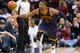 CLEVELAND, OH - JANUARY 18: Kyrie Irving #2 of the Cleveland Cavaliers dives for a loose ball during the second half against the Golden State Warriors at Quicken Loans Arena on January 18, 2016 in Cleveland, Ohio. The Warriors defeated the Cavaliers 132-9