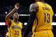 PHOENIX, AZ - JANUARY 19: Myles Turner #33 of the Indiana Pacers high fives Paul George #13 after scoring against the Phoenix Suns during the second half of the NBA game at Talking Stick Resort Arena on January 19, 2016 in Phoenix, Arizona. The Packers
