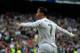 Real Madrid's Portuguese forward Cristiano Ronaldo celebrates after scoring during the Spanish league football match Real Madrid CF vs Real Sporting de Gijon at the Santiago Bernabeu stadium in Madrid on January 17, 2016. AFP PHOTO/ PEDRO ARMESTRE / AFP