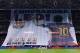 Barcelona supporters display a giant banner reading 'Congratulations Leo' (for Barcelona's Argentinian forward Lionel Messi) before the Spanish league football match FC Barcelona vs Athletic Club Bilbao at the Camp Nou stadium in Barcelona on January 17,