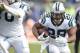 Jan 17, 2016; Charlotte, NC, USA; Carolina Panthers running back Jonathan Stewart (28) runs the ball for a touchdown during the second quarter against the Seattle Seahawks in a NFC Divisional round playoff game at Bank of America Stadium. Mandatory Credit