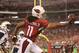 GLENDALE, AZ - SEPTEMBER 08: Wide receiver Larry Fitzgerald #11 of the Arizona Cardinals attempts to catch a pass during the NFL game against the San Diego Chargers at the University of Phoenix Stadium on September 8, 2014 in Glendale, Arizona. The Cardi