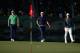 ABU DHABI, UNITED ARAB EMIRATES - JANUARY 21: (L-R) Jordan Spieth of the USA, Rickie Fowler of the USA and Rory McIlroy of Northern Ireland walk onto the 12th green during the first round of the Abu Dhabi HSBC Golf Championship at the Abu Dhabi Golf Cub