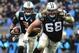 Andrew Norwell (68) blocks for Panthers quarterback Cam Newton.