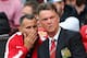 MANCHESTER, ENGLAND - AUGUST 16: Manchester United Manager Louis van Gaal speaks with Assistant Ryan Giggs (L) prior to the Barclays Premier League match between Manchester United and Swansea City at Old Trafford on August 16, 2014 in Manchester, England