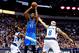 Jan 22, 2016; Dallas, TX, USA; Oklahoma City Thunder forward Kevin Durant (35) shoots over Dallas Mavericks guard Wesley Matthews (23) and guard Deron Williams (8) during the second half at American Airlines Center. Mandatory Credit: Kevin Jairaj-USA TODA