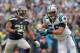 CHARLOTTE, NC - JANUARY 17: Luke Kuechly #59 of the Carolina Panthers returns an interception for a touchdown during the first quarter of the NFC Divisional Playoff Game against the Seattle Seahawks at Bank of America Stadium on January 17, 2016 in Charl